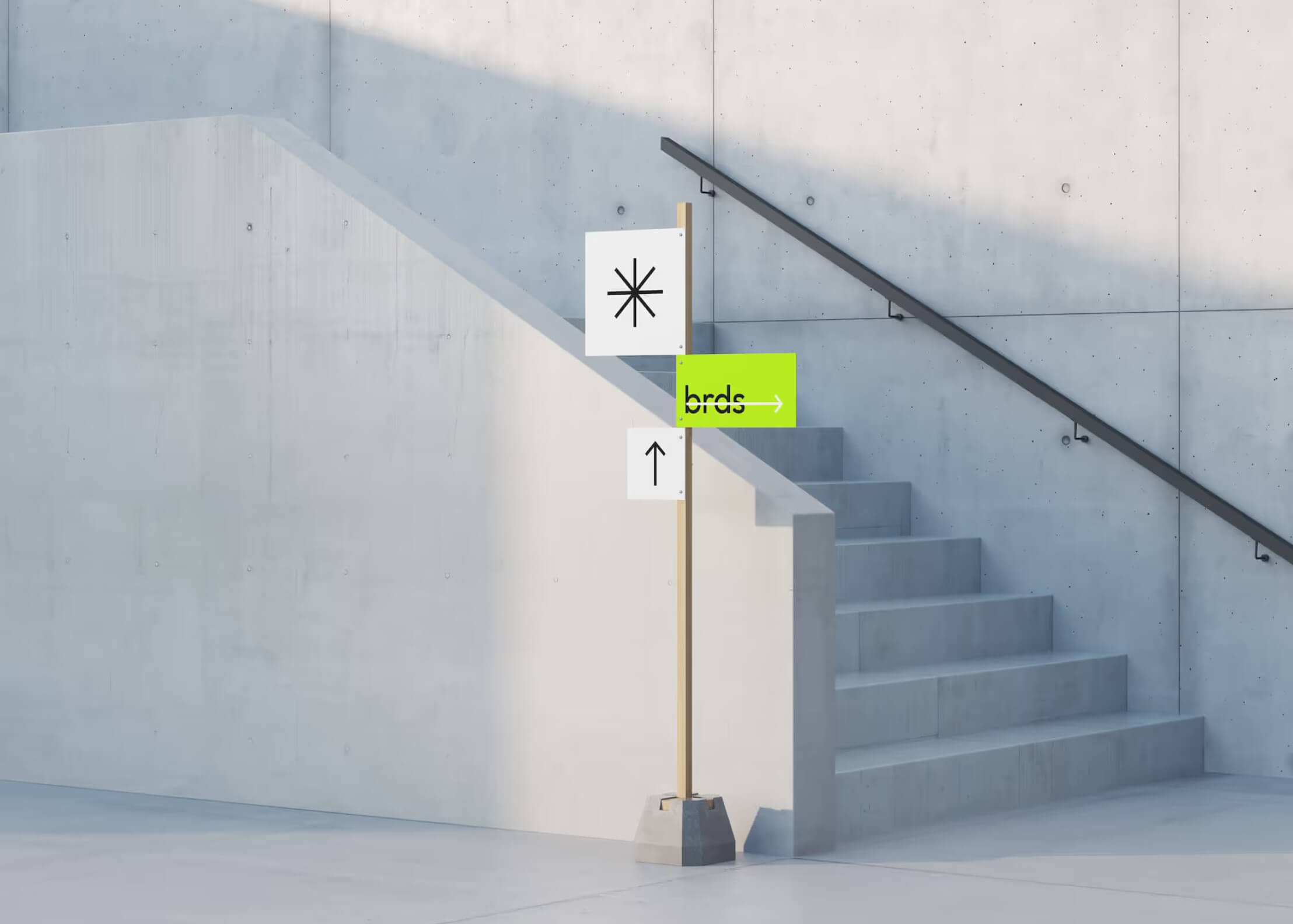 A green sign sitting on the side of a cement wall.